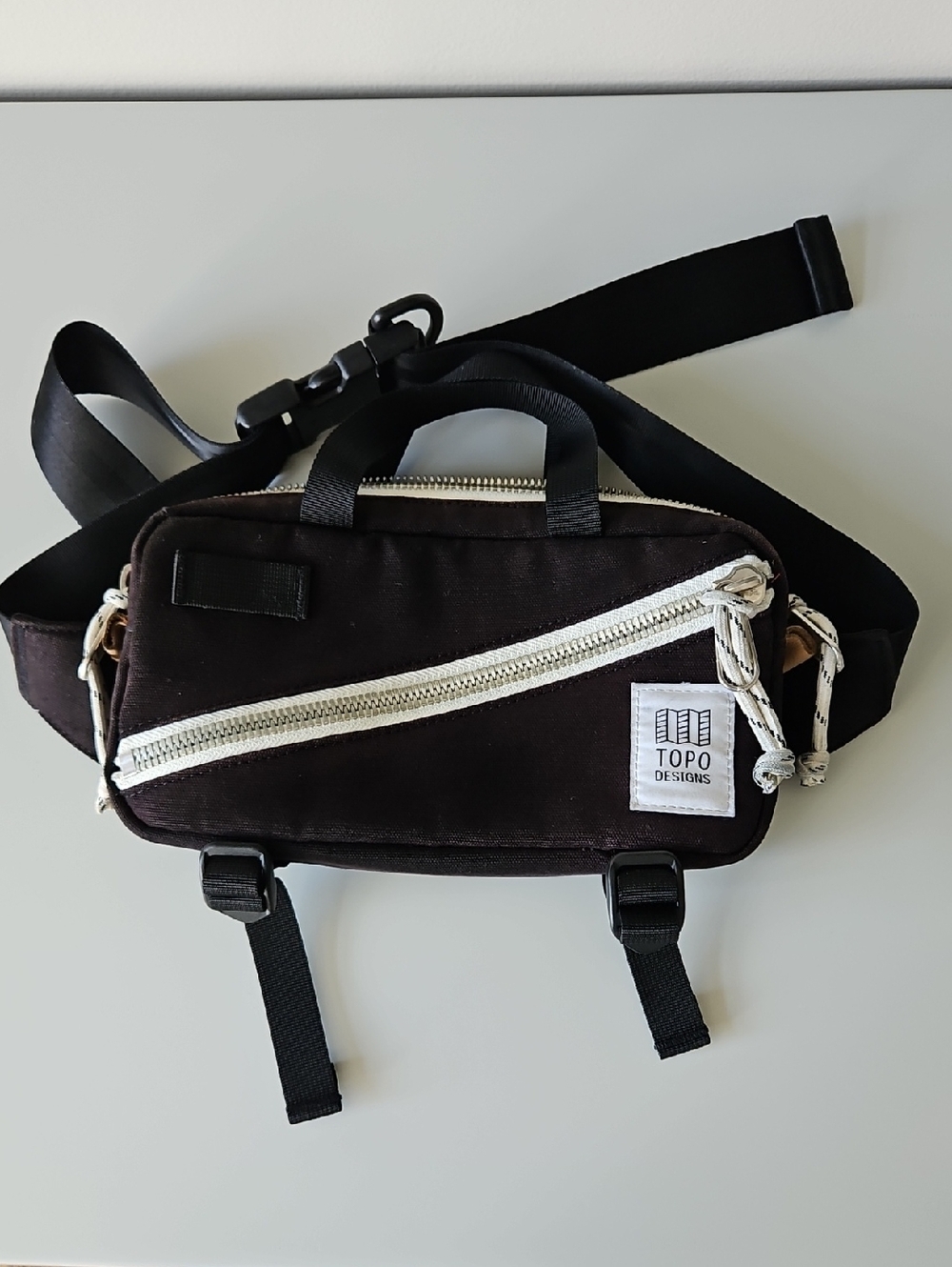 Topo Designs Black Belt Sling Pack with Contrast White Zipper